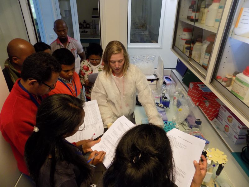 Claire Sanderson trains laboratory staff at institute pasteur on dried blood spot techniques