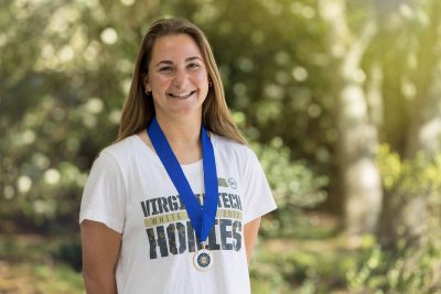 Headshot of Grace Kennedy wearing her Phi Kappa Phi Medallion. 